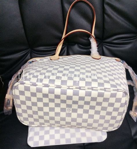 how to spot fake louis vuitton neverfull damier ebene|is louis vuitton neverfull real.